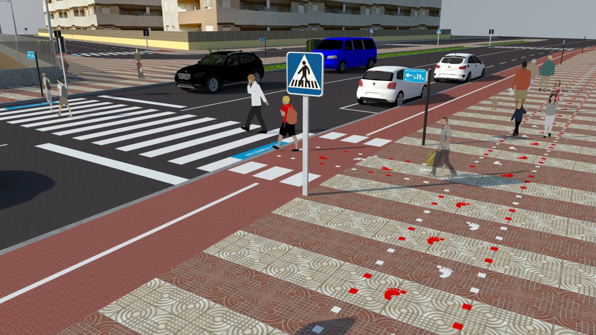 Imagen de las huellas que marcarán en las aceras la ruta para llegar al colegio.