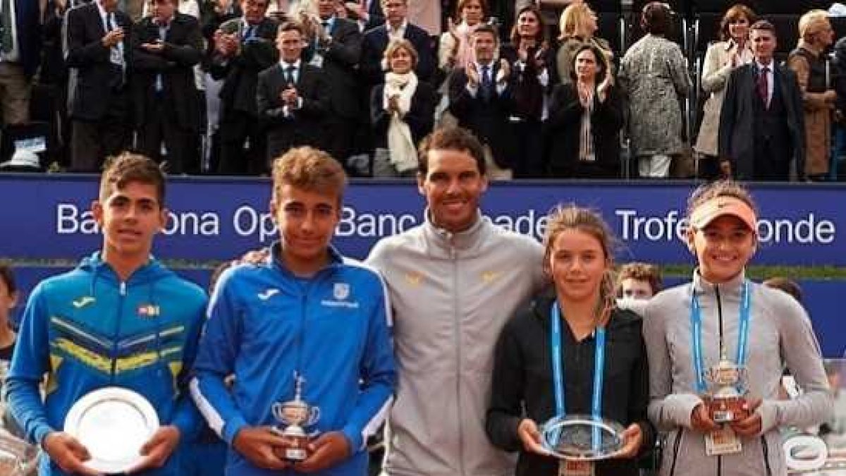 Guerrero con Rafa Nadal y el cuadro de campeones.
