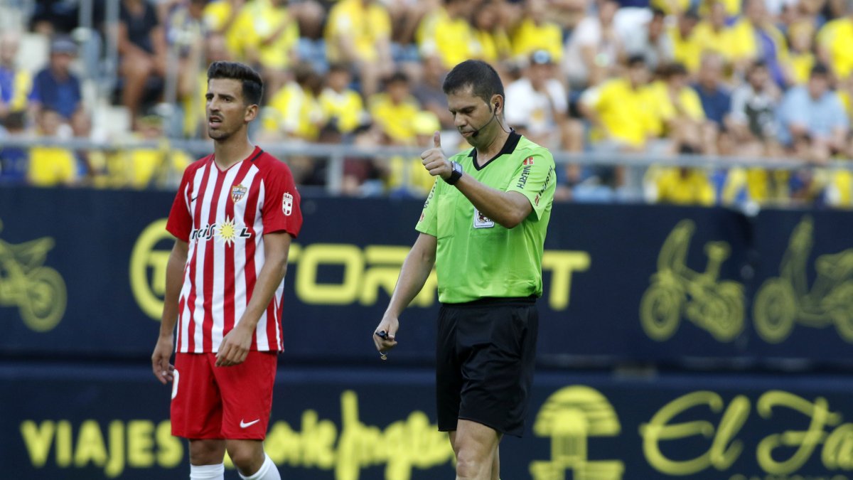 Trujillo Suárez con Juan Carlos Real.