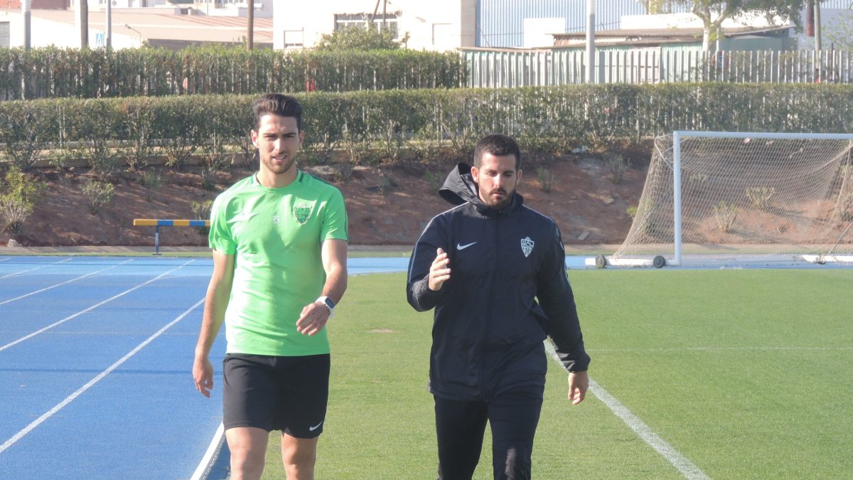 Juan Ibiza, con Eduardo Frapolli, preparador físico y readaptador.