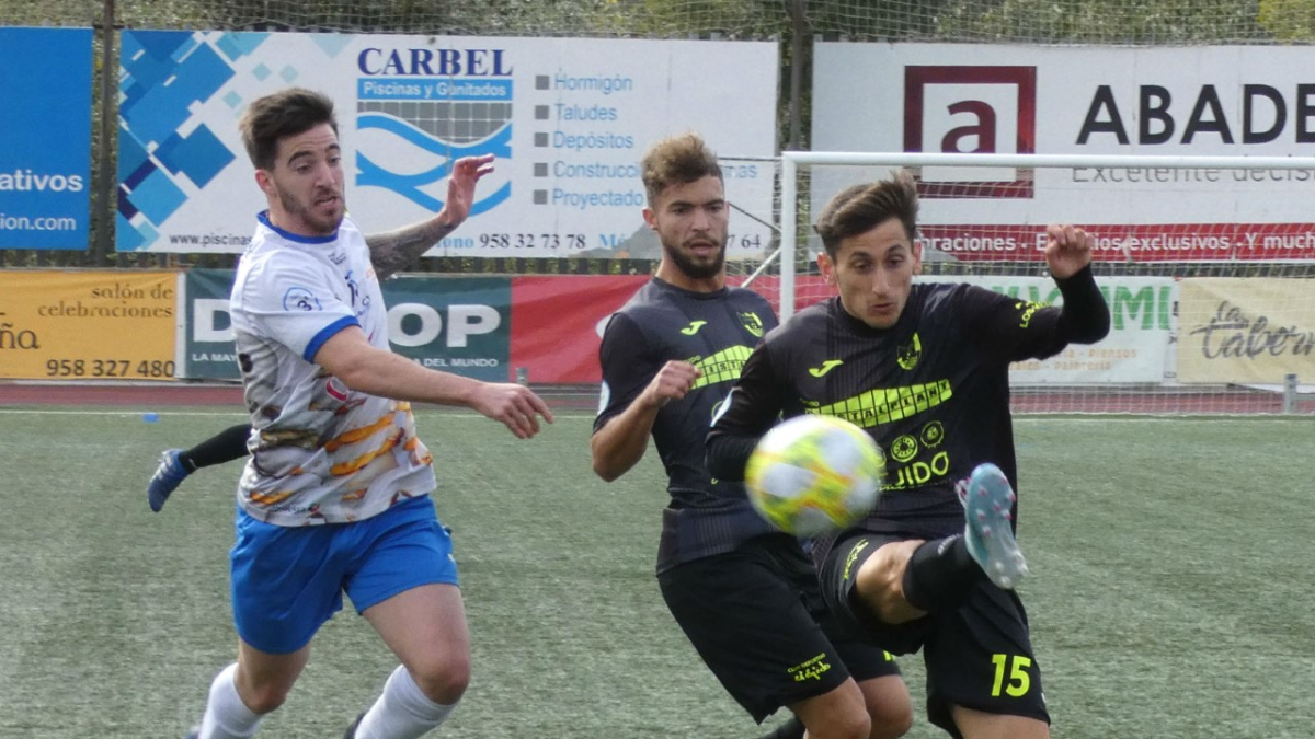 Juanje y Dani en el partido celebrado en Loja.