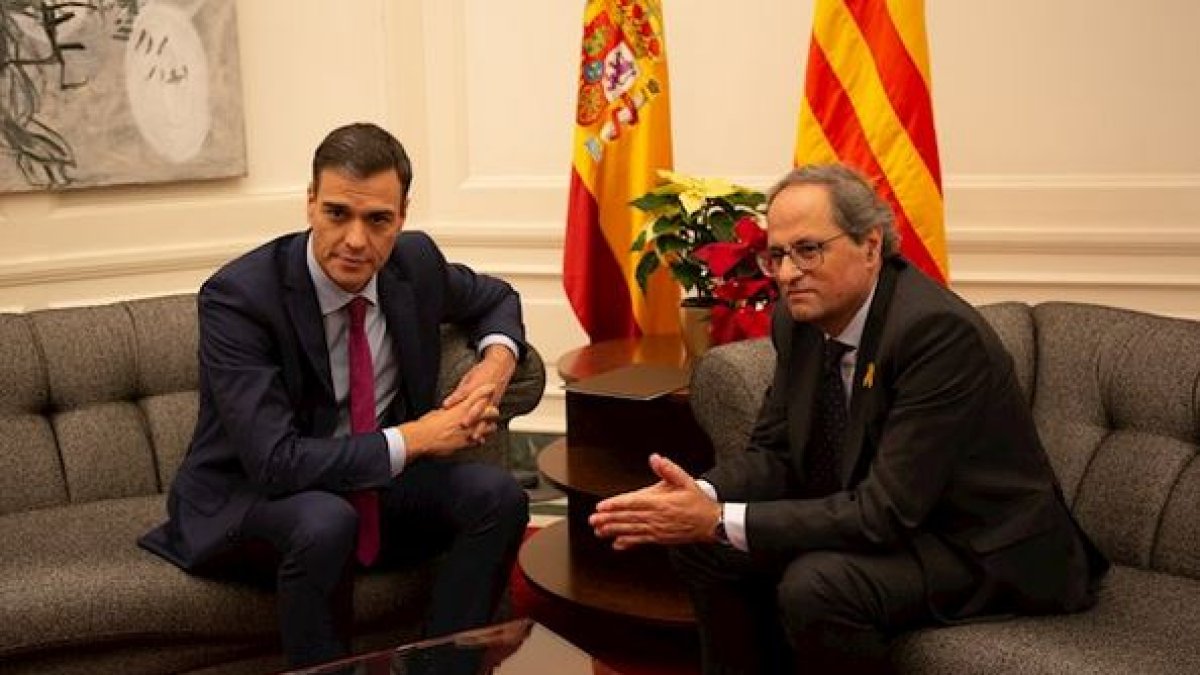 Imagen de una reunión entre Sánchez y Quim Torra