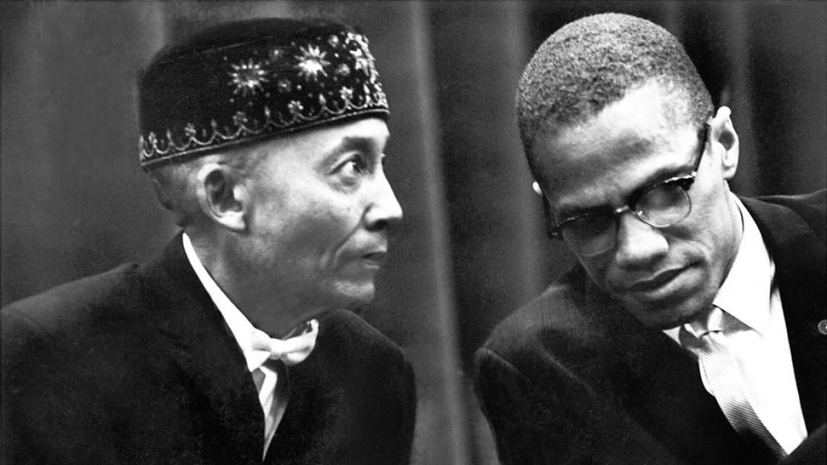 Malcolm X con el líder NOI, Elijah Muhammad.
