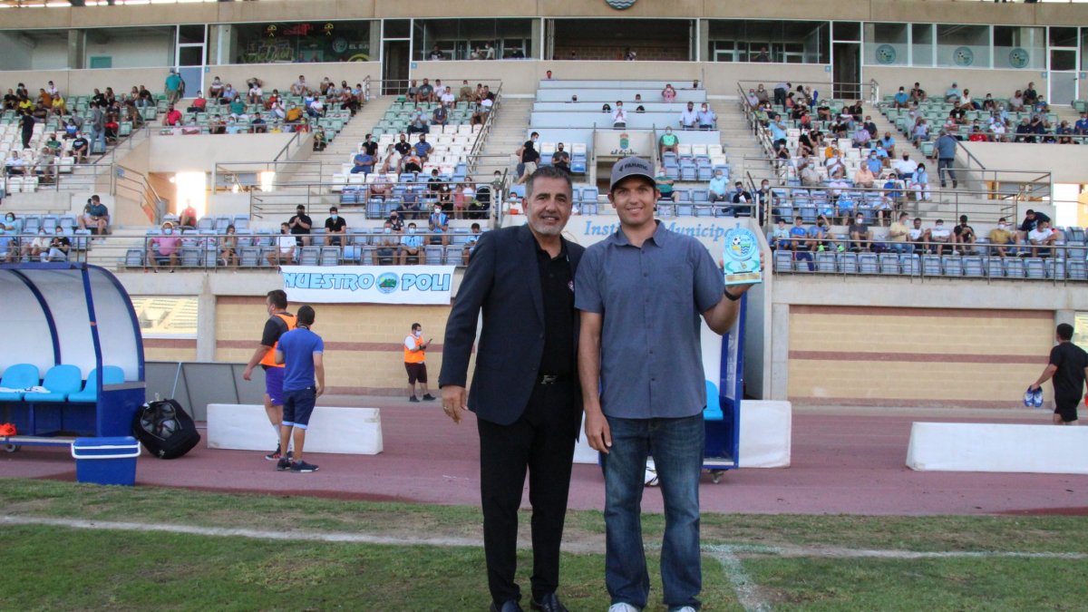 El presidente celeste con el campeón del mundo.