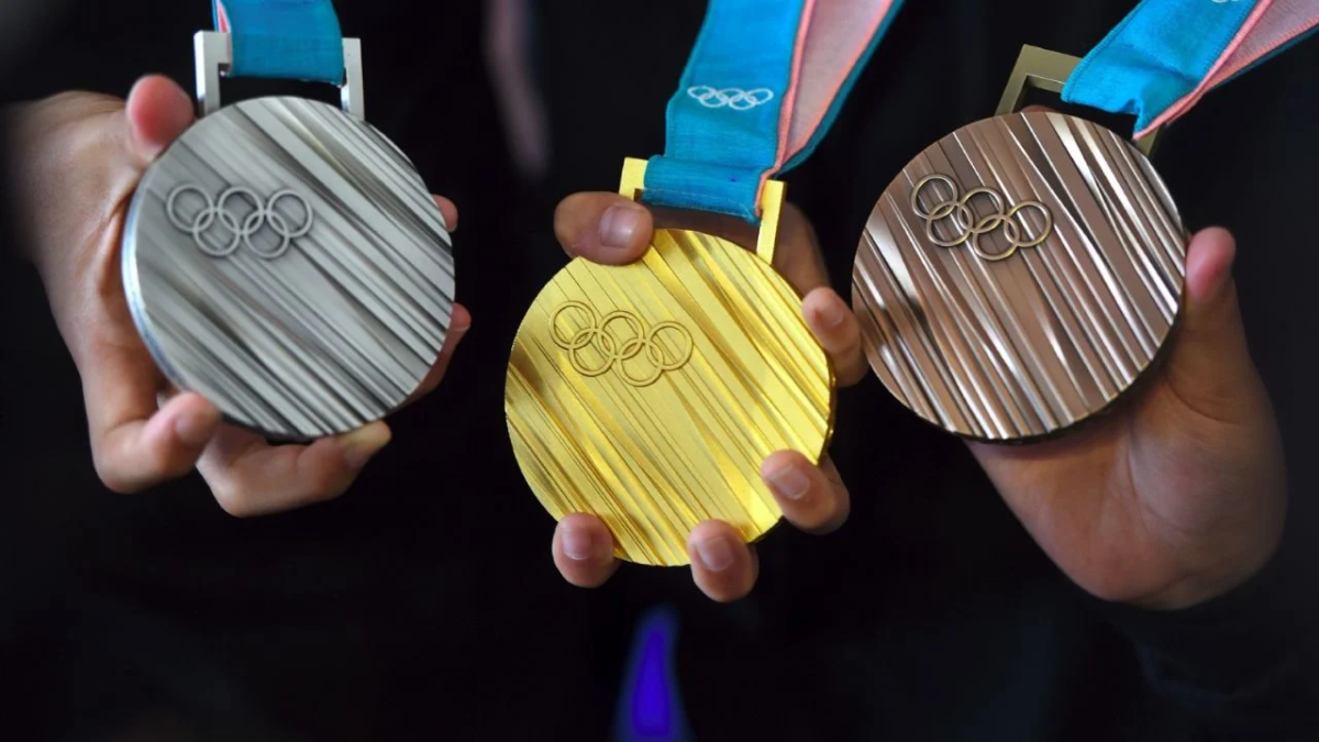 Medallas de oro, plata y bronce en unos juegos.