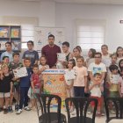 Entrega de premios a los ganadores del 'Pasaporte Lector' en la Biblioteca de Adra.