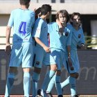 Cristo Muñoz, al fondo, celebrando un gol con el Barça.