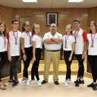 El concejal José Juan Rubí con los deportistas.