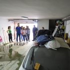 Visita a un garaje afectado por las inundaciones que se produjeron la madrugada del pasado viernes