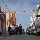 Cordón de agentes de la Policía Nacional en la calle Ruano