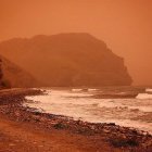 El Cabo de Gata tenido del tono rojizo provocado por el polvo africano