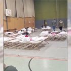 Camas instaladas en un pabellón de Karlsruhe para los niños que vendrán a Almería.