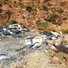Imagen de la rambla llena de basura. (FOTO: Policía Local de Balanegra).