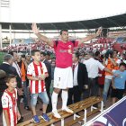 Esteban con su familia celebrando la permanencia con el Almería en el año 2014.