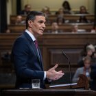 El presidente del Gobierno en funciones, Pedro Sánchez, durante la primera sesión del debate de investidura en el Congreso de los Diputados.