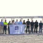 Autoridades y profesionales dentro del Plan de Playas presentado este martes.