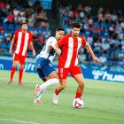 Melero siempre tapado por uno o dos contrarios.