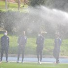 José Gomes y sus ayudantes en el campo Anexo.