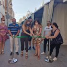 Autoridades y comerciantes en la inauguración del evento.