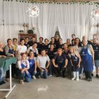 Trabajadores del Pao Blanco, una de las cofradías instaladas en al feria.