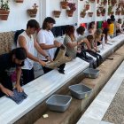 Hasta tres generaciones de mojaqueros se han dado cita para revivir esta tradición.