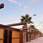 Casetas de madera instaladas en el paseo marítimo de San Juan de los Terreros.