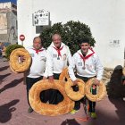 Miembros de la Peña de San Sebastián y San Ildefonso de Olula del Río tras la procesión.