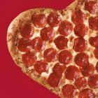 Pizza con forma de corazón.