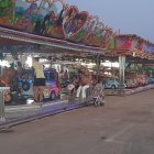 Imágenes de las atracciones paradas en el Recinto Ferial de Almería.