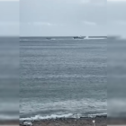 La patrullera de la Guardia Civil, detrás de varias narcolanchas este sábado 7 de febrero.