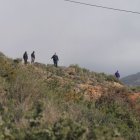Agentes de la Guardia Civil y vecinos, durante la batida del pasado sábado, 14 de febrero.