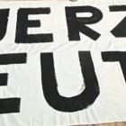 Pancarta con "Fuerza Ceuta" retirada a la Grada Joven antes de acceder al estadio en el Almería-Cádiz.