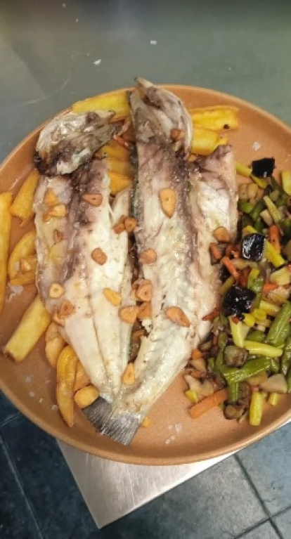 Lubina a la espalda con verduras.