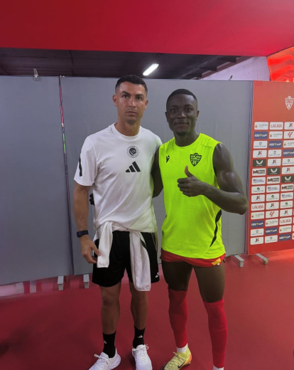 Cristiano Ronaldo el pasado verano con Patrick Soko.